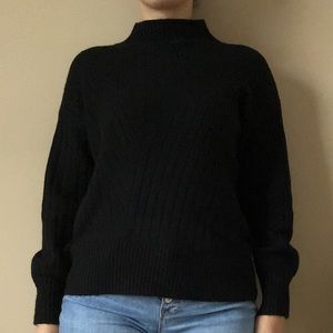 Ribbed sweater with funnel neck in black